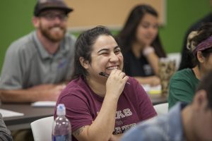 ACC students laugh in class